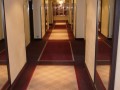 Hotelflur, Teppich, auf Kundenwunsch mit Einarbeitung von Intarsien in einem Stück